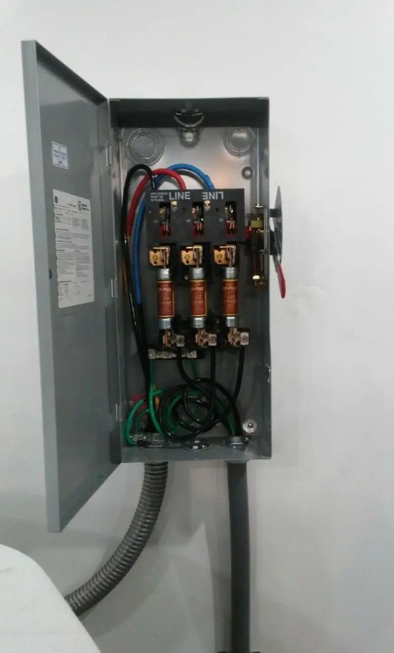 Three-phase disconnect switch installed for Smoke Detector Installation in Blackstone